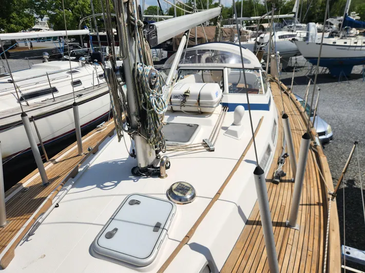 Vivace 1 Yacht Photos Pics 2002 Hallberg-Rassy 36 MKII sailboat with teak deck and rigging, docked in a marina.