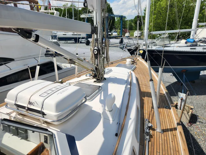 Vivace 1 Yacht Photos Pics 2002 Hallberg-Rassy 36 MKII sailboat with teak deck and rigging, docked in a marina.