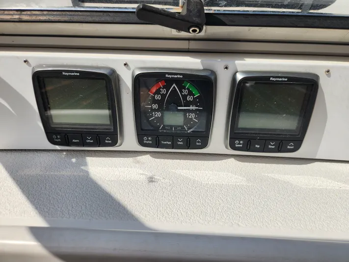 Vivace 1 Yacht Photos Pics Raymarine instruments on a 2002 Hallberg-Rassy 36 MKII yacht dashboard.
