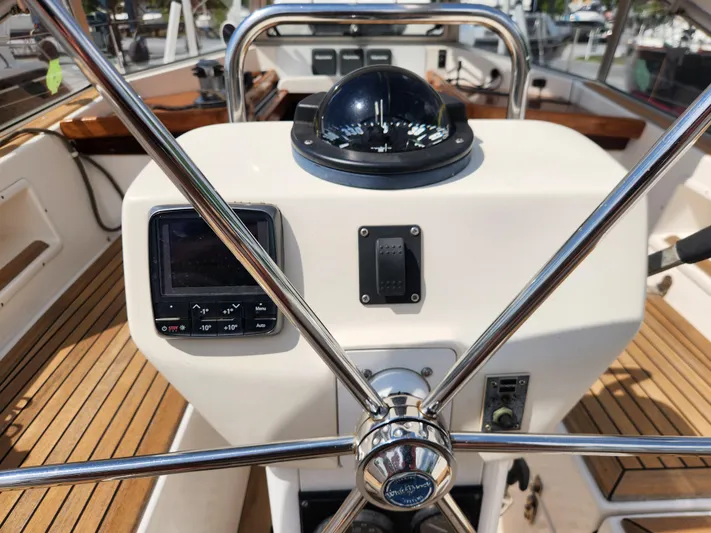 Vivace 1 Yacht Photos Pics Steering wheel and navigation instruments on a 2002 Hallberg-Rassy 36 MKII yacht.