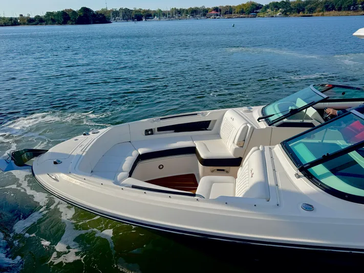  Yacht Photos Pics 2019 Sea Ray SLX 310 boat on calm water, featuring spacious seating and sleek design.