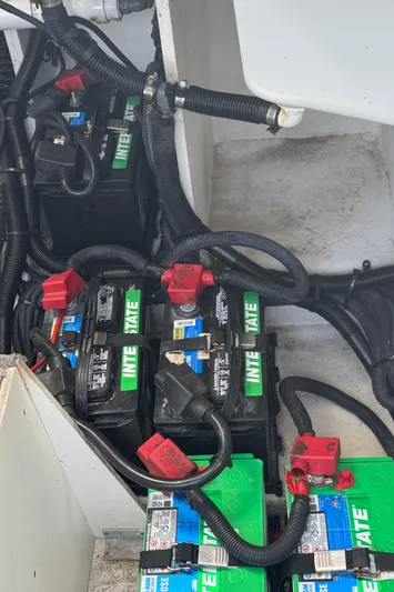  Yacht Photos Pics Batteries and wiring in a 2019 Sea Ray SLX 310 boat compartment.