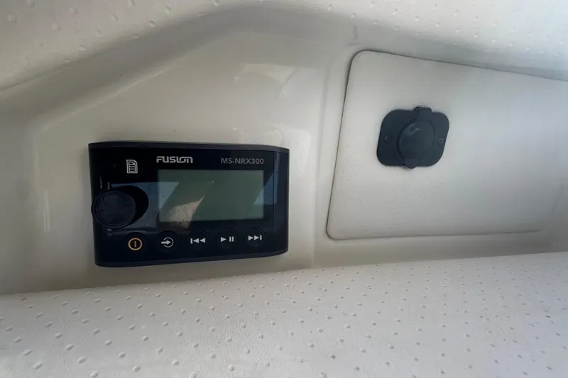  Yacht Photos Pics Fusion MS-NRX300 stereo system on 2019 Sea Ray SLX 310 boat dashboard.