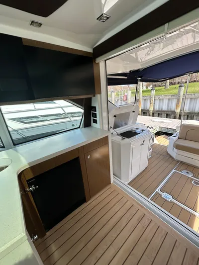  Yacht Photos Pics 2014 Cruisers Yachts 41 Cantius interior with modern design and spacious deck area.