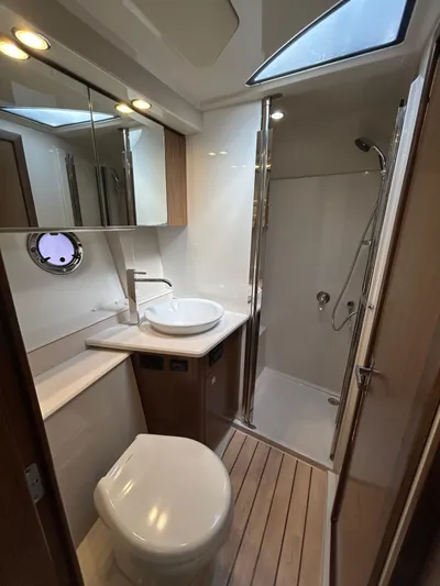  Yacht Photos Pics Luxurious bathroom in 2014 Cruisers Yachts 41 Cantius with modern fixtures and shower.