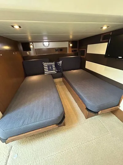  Yacht Photos Pics 2014 Cruisers Yachts 41 Cantius cabin with twin beds and nautical decor.