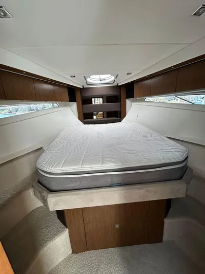  Yacht Photos Pics 2014 Cruisers Yachts 41 Cantius cabin with bed, modern interior design.