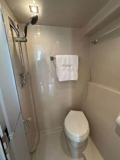  Yacht Photos Pics 2014 Cruisers Yachts 41 Cantius bathroom with shower and toilet.