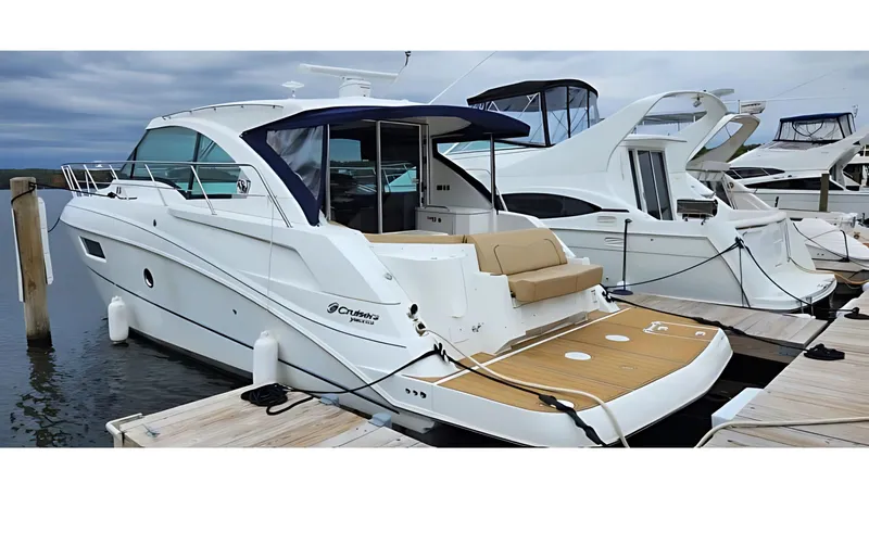  Yacht Photos Pics 2014 Cruisers Yachts 41 Cantius docked, featuring sleek design and spacious deck.