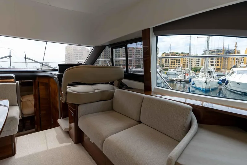  Yacht Photos Pics Luxurious interior of 2024 Princess F45 yacht with marina view.