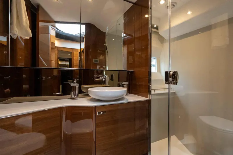  Yacht Photos Pics Luxurious bathroom interior of 2024 Princess F45 yacht with modern fixtures and elegant design.