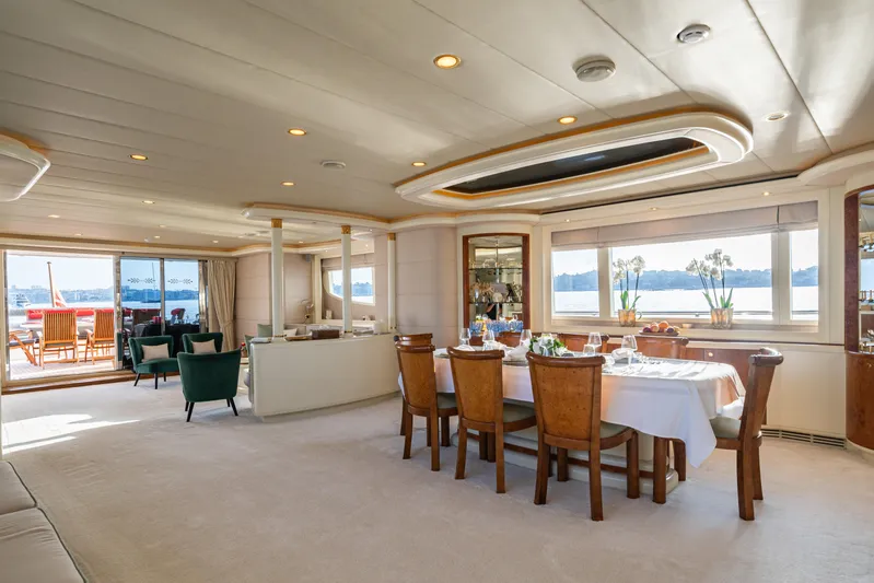 Viking III Yacht Photos Pics Luxurious dining area on 2004 Notika CENTURION 115 yacht with elegant decor and scenic views.
