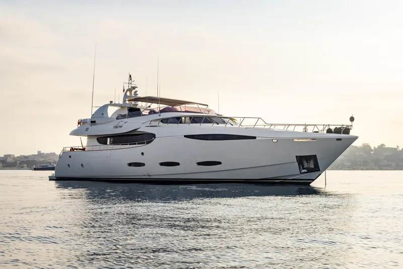 Viking III Yacht Photos Pics Luxury yacht Notika CENTURION 115, 2004 model, anchored on calm waters.