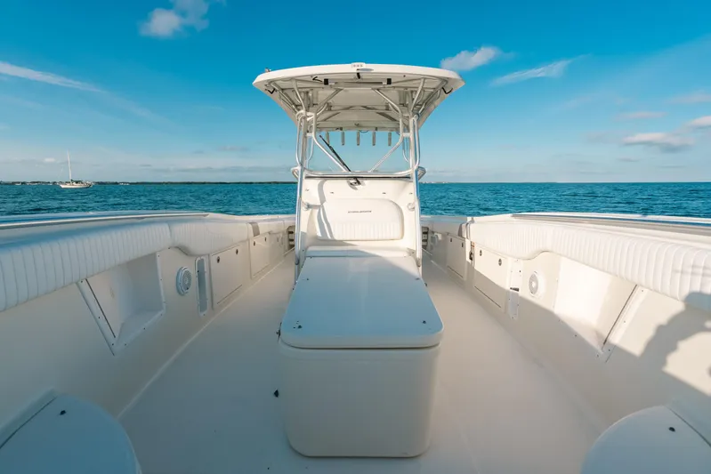  Yacht Photos Pics 2005 Hydra-Sports 3300 CC boat on open water under clear blue sky.