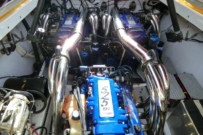  Yacht Photos Pics Engine compartment of a 2006 Fountain 47 Lightning boat with polished components.