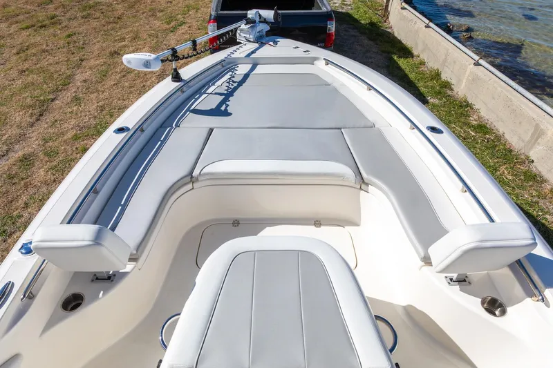  Yacht Photos Pics 2023 ShearWater 260 SS Carolina boat interior with cushioned seating and trolling motor.