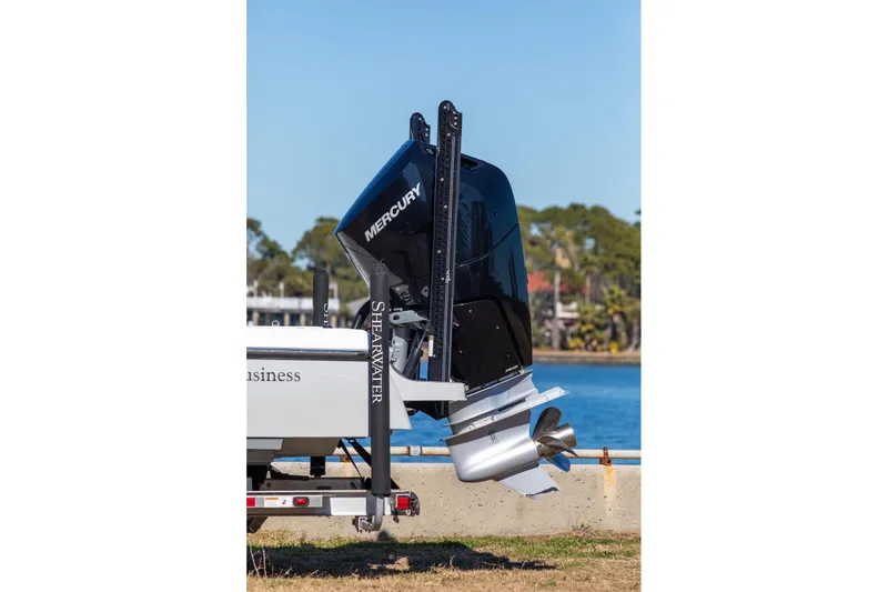  Yacht Photos Pics 2023 ShearWater 260 SS Carolina boat with Mercury outboard motor by the water.