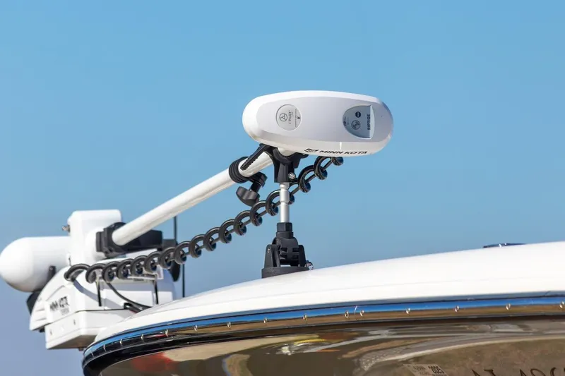  Yacht Photos Pics Trolling motor on 2023 ShearWater 260 SS Carolina boat under clear blue sky.