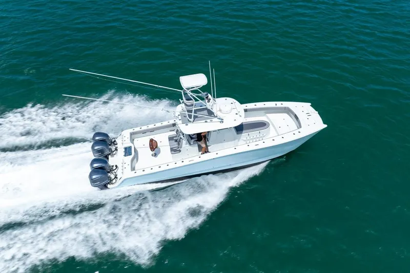  Yacht Photos Pics 2018 Freeman 37VH boat cruising on clear blue water, aerial view.