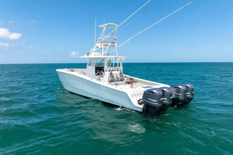  Yacht Photos Pics 2018 Freeman 37VH boat with Yamaha engines on open sea under clear blue sky.