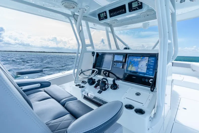  Yacht Photos Pics 2018 Freeman 37VH boat cockpit with advanced navigation systems on open water.