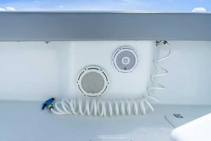  Yacht Photos Pics Freeman 37VH 2018 boat deck with speakers and coiled hose.
