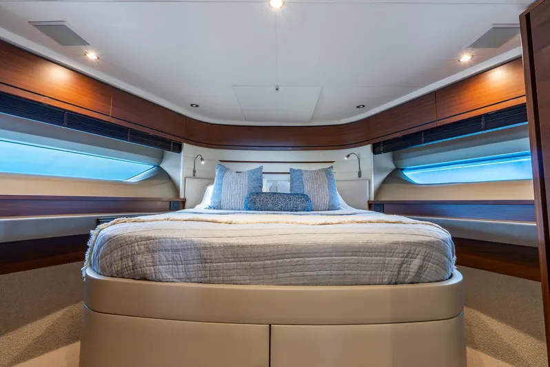 Mamu Yacht Photos Pics Luxurious bedroom interior of 2018 Princess F-68 yacht with modern design and ambient lighting.