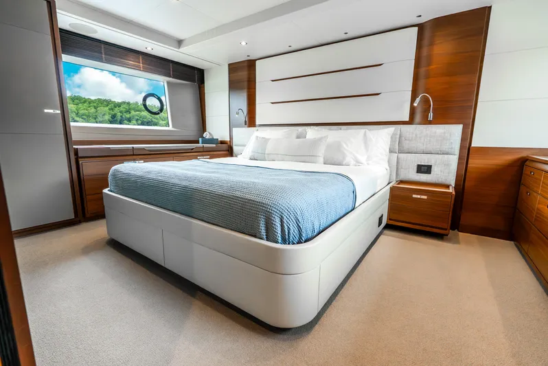 Mamu Yacht Photos Pics Luxurious bedroom interior on 2018 Princess F-68 yacht with modern design and scenic window view.
