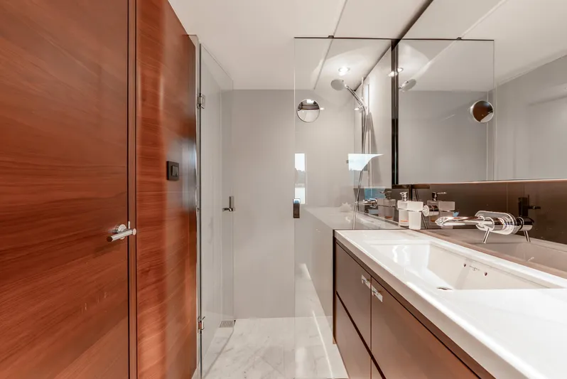Mamu Yacht Photos Pics Luxurious bathroom interior on 2018 Princess F-68 yacht, featuring sleek design and modern fixtures.