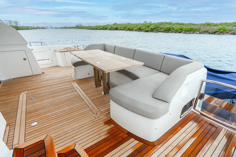 Mamu Yacht Photos Pics Luxurious 2018 Princess F-68 yacht deck with elegant seating and scenic water view.