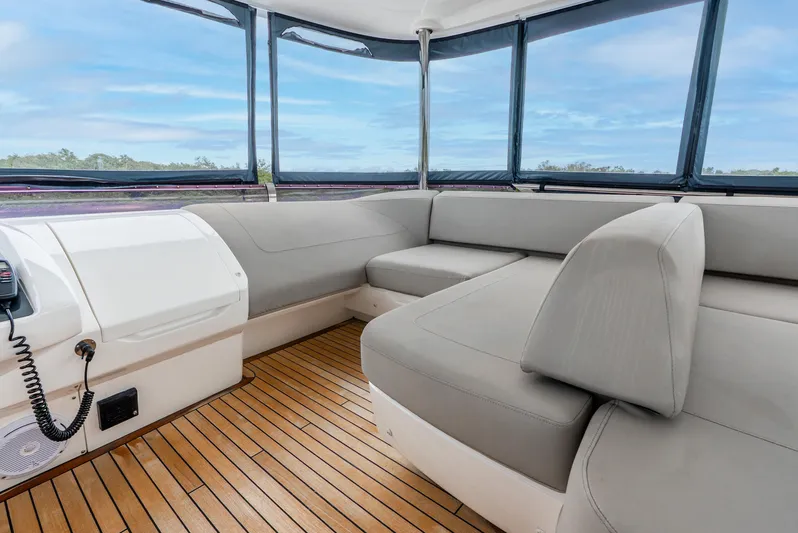 Mamu Yacht Photos Pics Luxurious 2018 Princess F-68 yacht interior with sleek seating and wooden flooring.