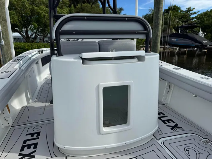  Yacht Photos Pics 2021 Yellowfin 26 Hybrid boat interior with seating and storage compartment.