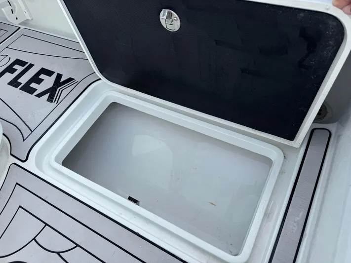  Yacht Photos Pics Open storage compartment on 2021 Yellowfin 26 Hybrid boat deck.