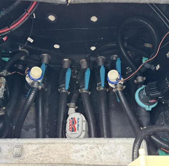  Yacht Photos Pics Bilge area of 2021 Yellowfin 26 Hybrid boat with pumps and hoses.