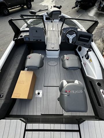 2024 Vexus ADX190 boat interior with gray seating and modern dashboard.