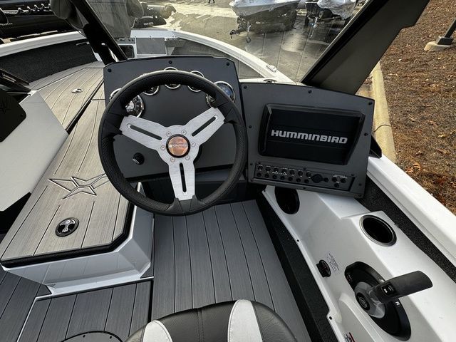 2024 Vexus ADX190 boat cockpit with steering wheel and Humminbird navigation system.