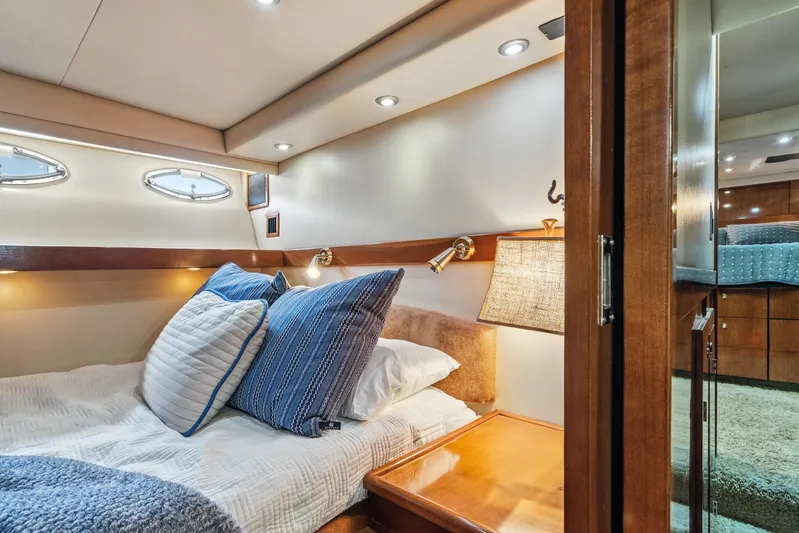 Trust Yacht Photos Pics Luxurious cabin interior of 2007 Meridian 490 Pilothouse yacht with cozy bedding.