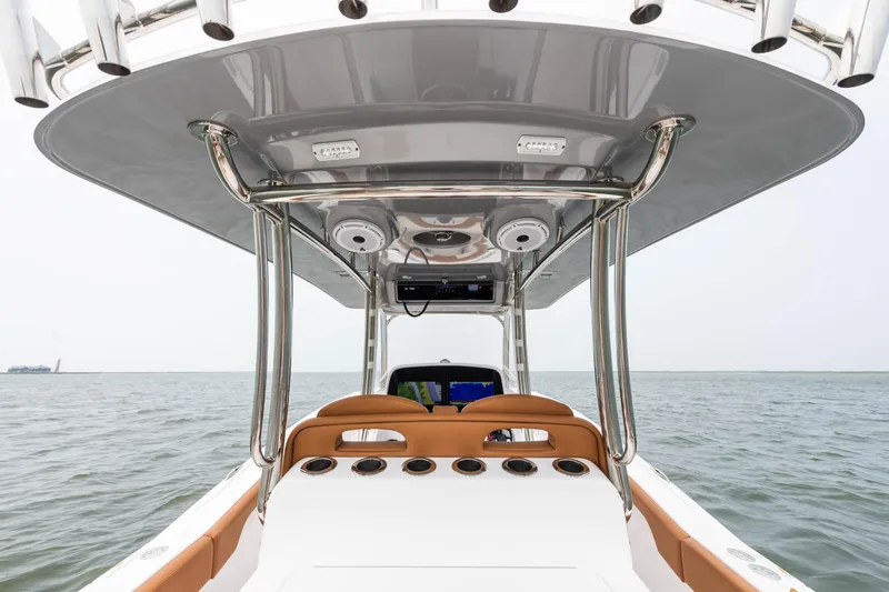  Yacht Photos Pics 2022 Mag Bay 33cc boat with T-top on open water.