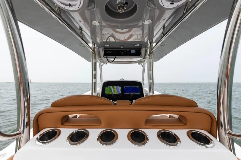  Yacht Photos Pics 2022 Mag Bay 33cc boat helm with navigation system and rod holders.