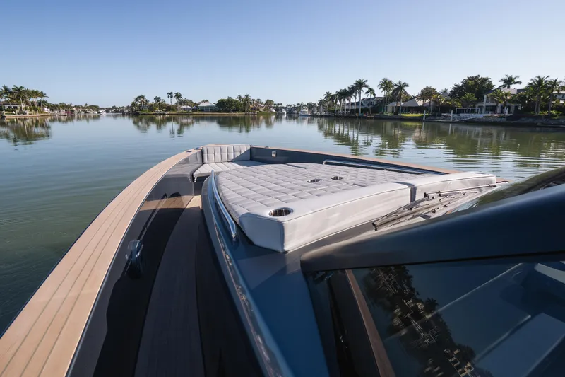  Yacht Photos Pics 2025 Pardo Yachts P43 on tranquil water, showcasing sleek design and luxurious deck.