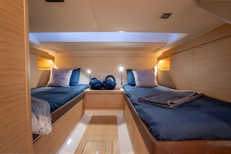  Yacht Photos Pics Luxurious cabin interior of 2025 Pardo Yachts P43 with twin beds and elegant lighting.