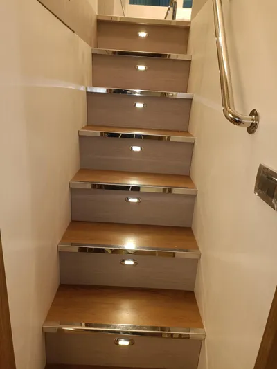  Yacht Photos Pics Staircase with LED lights on a 2022 Mazarin 55 Catamaran Diesel.