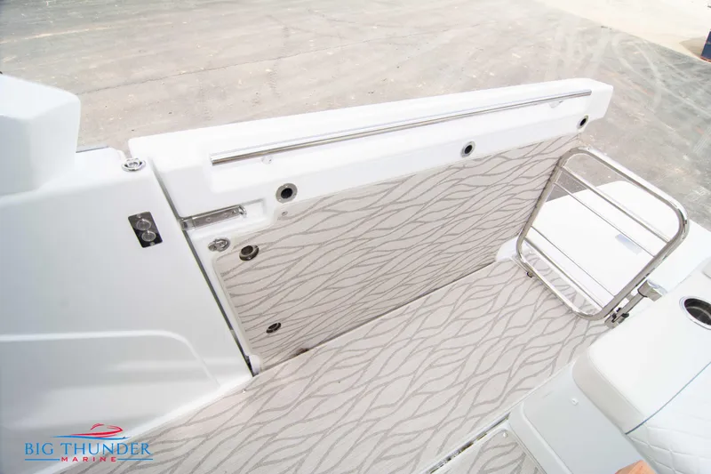  Yacht Photos Pics 2024 Jeanneau DB/37 OB boat interior with patterned flooring and side panel.