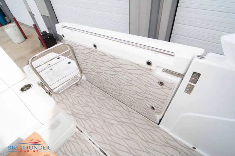  Yacht Photos Pics 2024 Jeanneau DB/37 OB boat interior with patterned flooring and stainless steel fixtures.