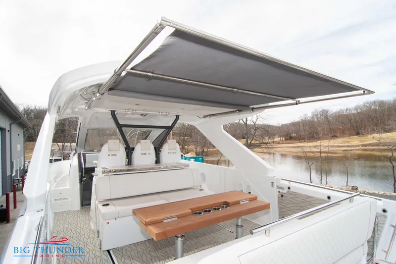  Yacht Photos Pics 2024 Jeanneau DB/37 OB boat with spacious deck and retractable sunshade.