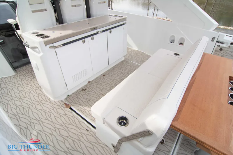  Yacht Photos Pics 2024 Jeanneau DB/37 OB boat interior with seating and storage.