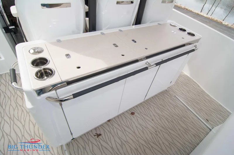  Yacht Photos Pics 2024 Jeanneau DB/37 OB boat interior with seating and storage.