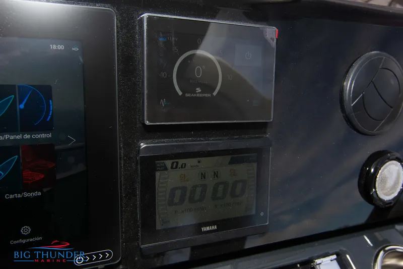  Yacht Photos Pics Control panel of the 2024 Jeanneau DB/37 OB boat with digital displays.