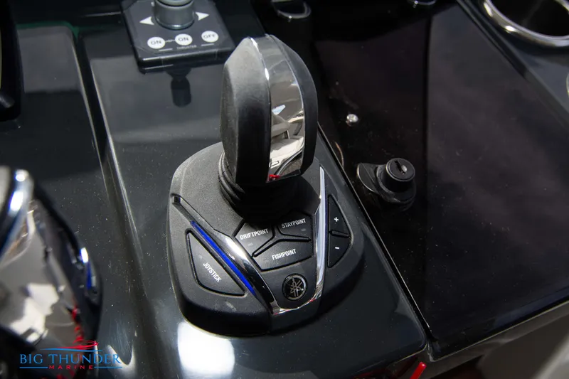  Yacht Photos Pics 2024 Jeanneau DB/37 OB boat control panel with joystick and buttons.