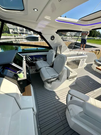  Yacht Photos Pics 2021 Sea Ray SLX 400 Outboard interior with modern helm and seating.